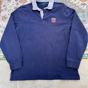 Polo Ralph Lauren navy rugby polo shirt with embroidered logo and thick fabric.