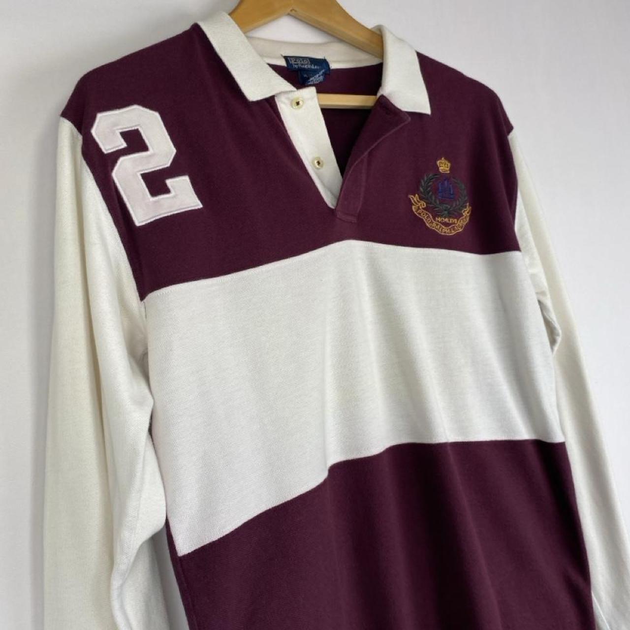 Polo Ralph Lauren burgundy rugby polo shirt with white stripes and embroidered logo.