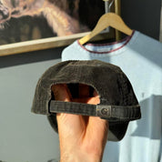 Carhartt WIP corduroy hat with embroidered logo and slight visor damage.