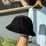 Carhartt WIP bucket hat brown corduroy with embroidered logo detail.
