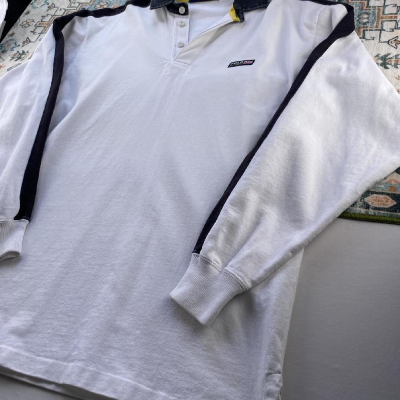 Polo Ralph Lauren white rugby polo shirt with embroidered logo and classic fit.