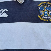Canterbury men's rugby polo shirt, navy blue, featuring Harper Adams University logo and classic collar.