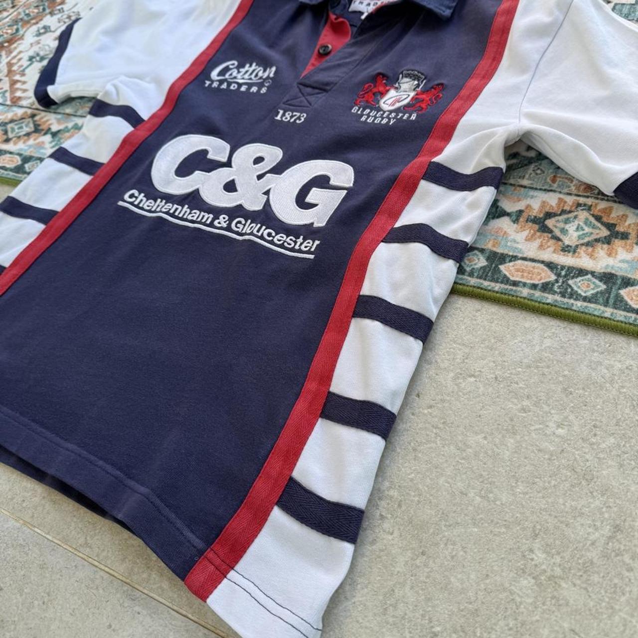 Cotton Traders men's polo shirt red with Gloucester Rugby logo and vintage cotton material.