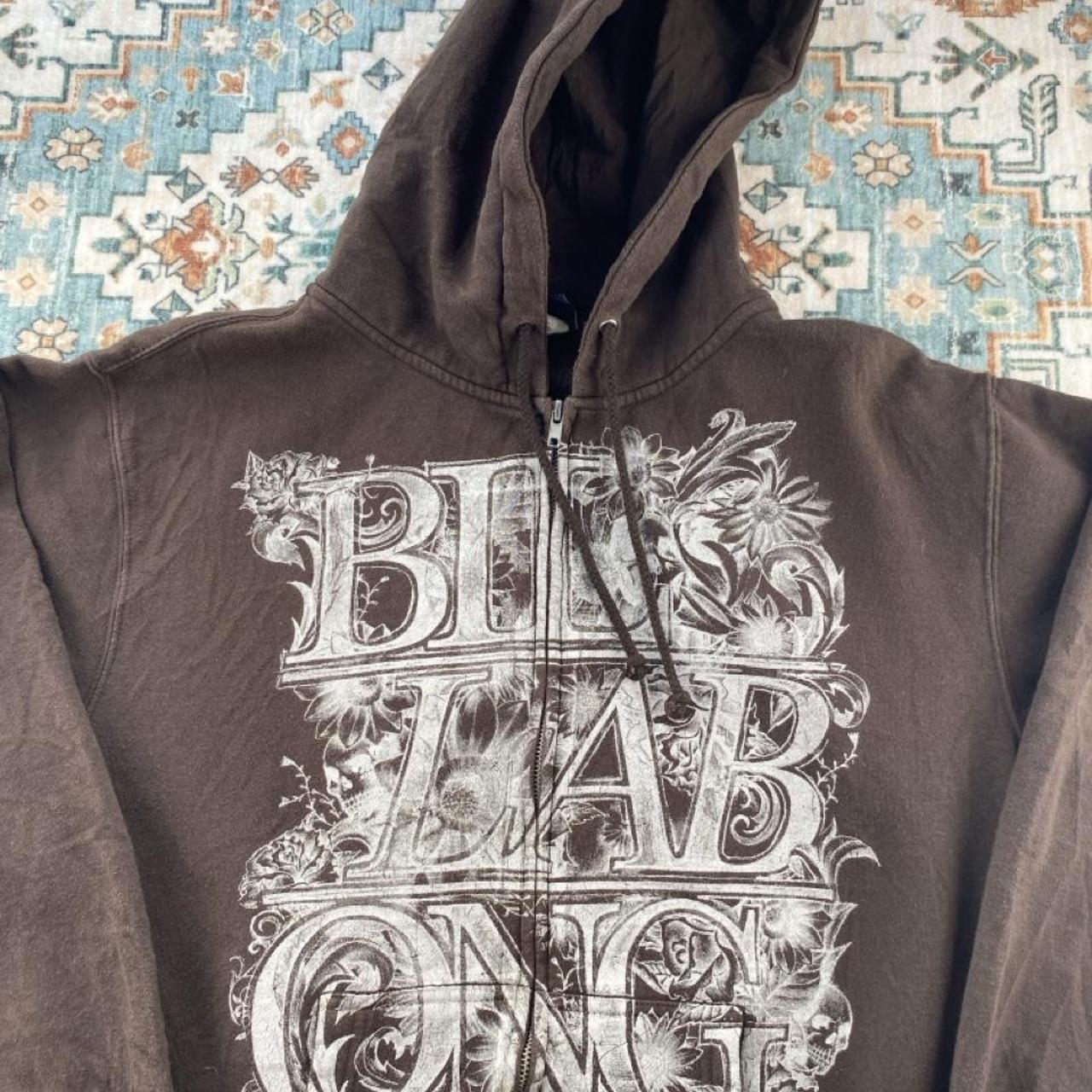 Billabong brown graphic hoodie with full zip and logo print design.