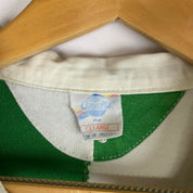 ONeills green and white checkered rugby polo shirt with vintage logo detail.
