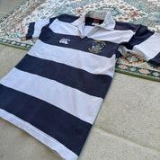 Canterbury men's rugby polo shirt, navy blue, featuring Harper Adams University logo and classic collar.