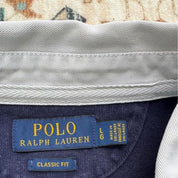 Polo Ralph Lauren navy rugby polo shirt with embroidered logo and thick fabric.