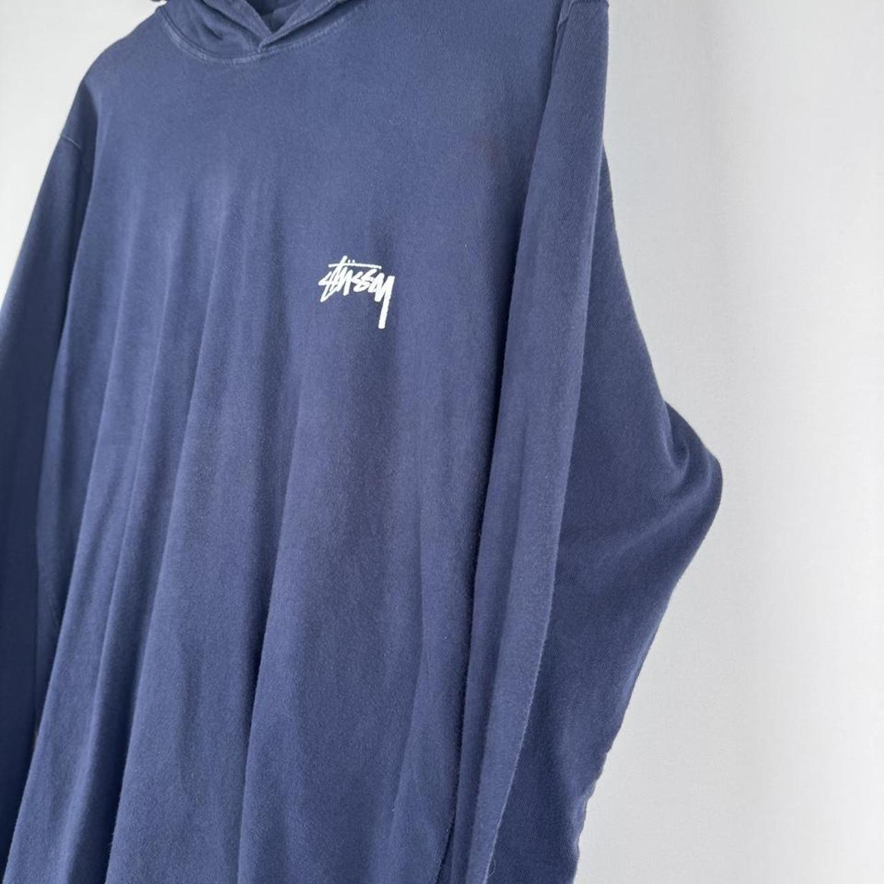 Stüssy grey hoodie with back print spellout logo, slim fit, cotton material.
