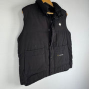 Canada Goose black down filled gilet with logo patch and zip pockets.