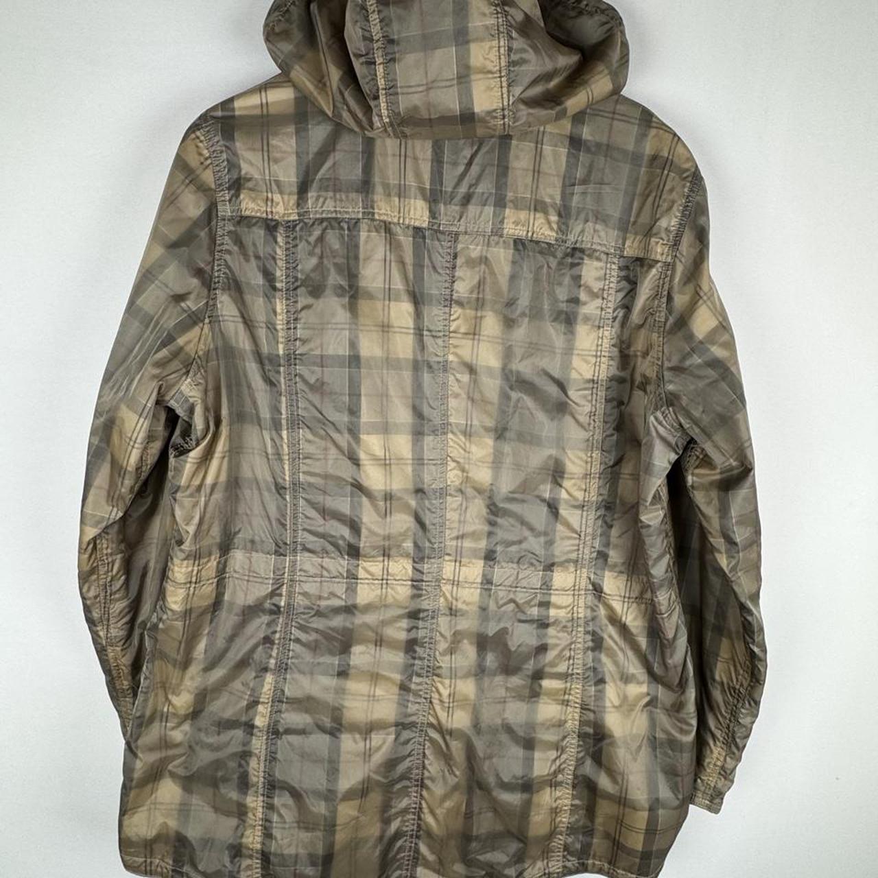 Barbour cream checkered parachute field jacket with relaxed fit and distinctive logo.