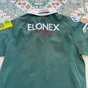 ISC green rugby polo shirt with embroidered London Irish logo and slim fit.