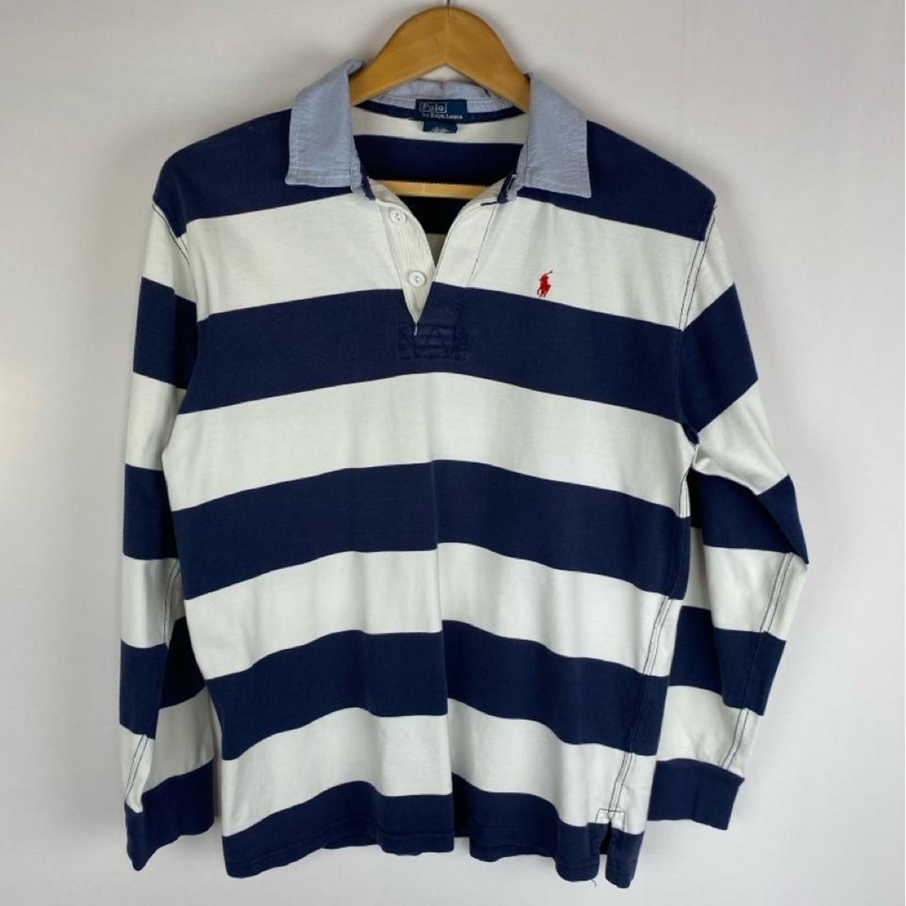Polo Ralph Lauren blue and navy striped rugby polo shirt with logo detail.
