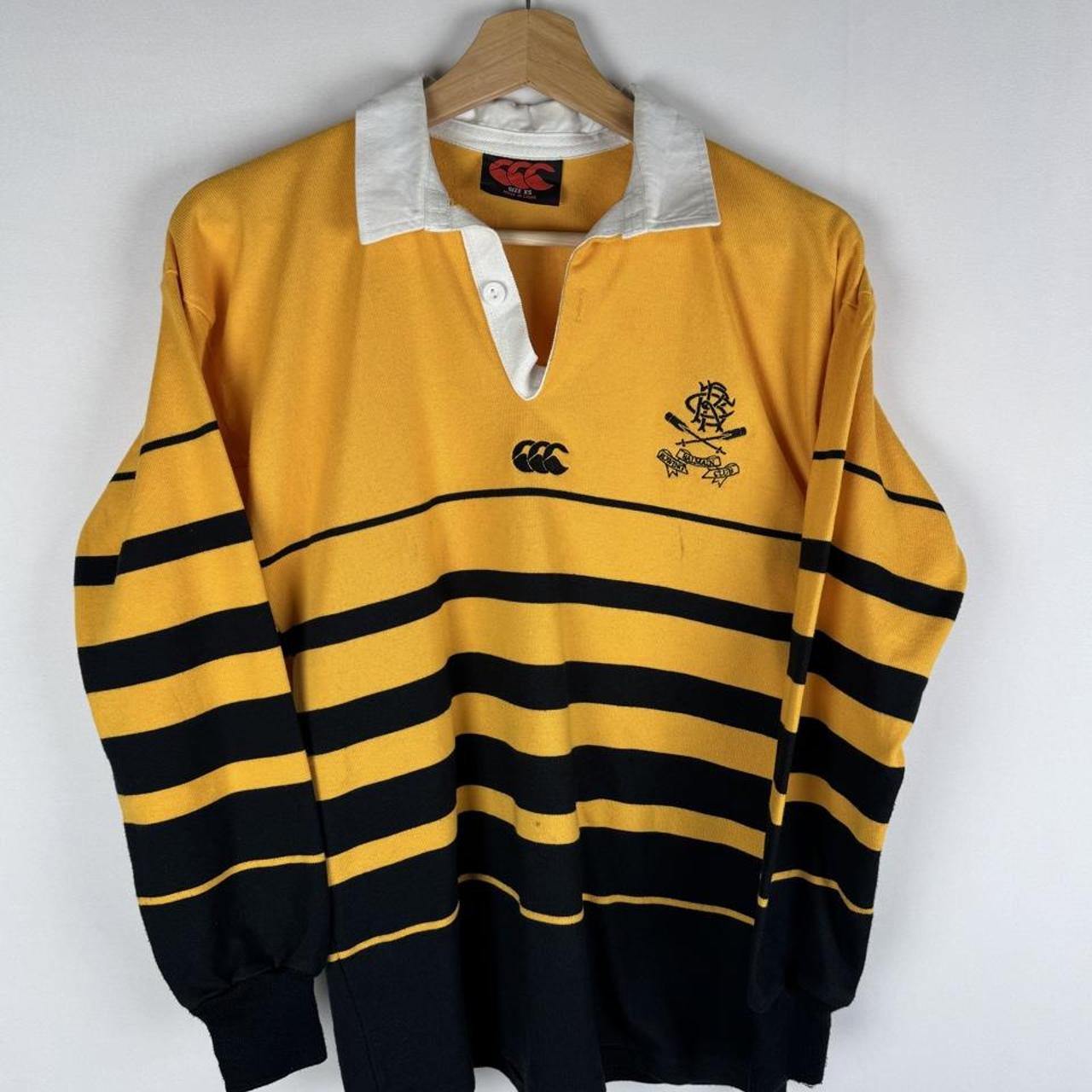 Canterbury men's rugby polo shirt navy blue with embroidered Balmain Rowing Club logo.