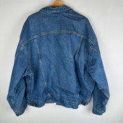 Carhartt denim trucker jacket 1990s style with classic logo and relaxed fit.