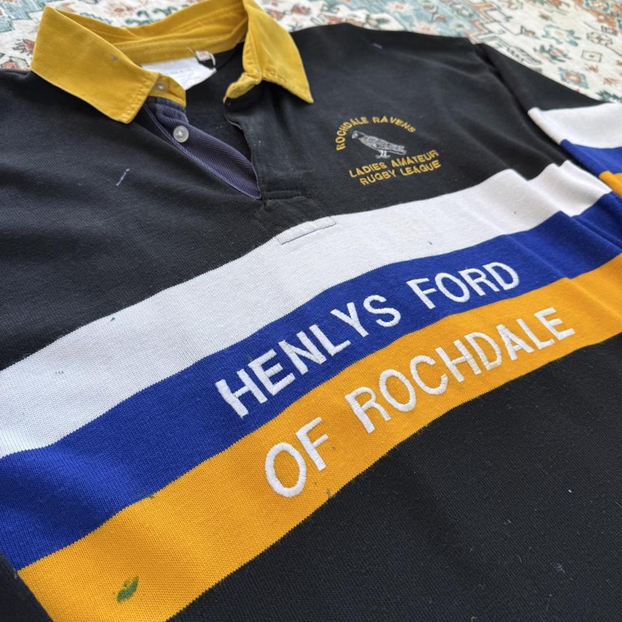Rochdale Ravens women's 1990s rugby polo, black with logo and vintage design details.