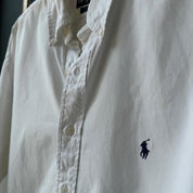 Polo Ralph Lauren white cotton shirt with embroidered logo and oversized fit.