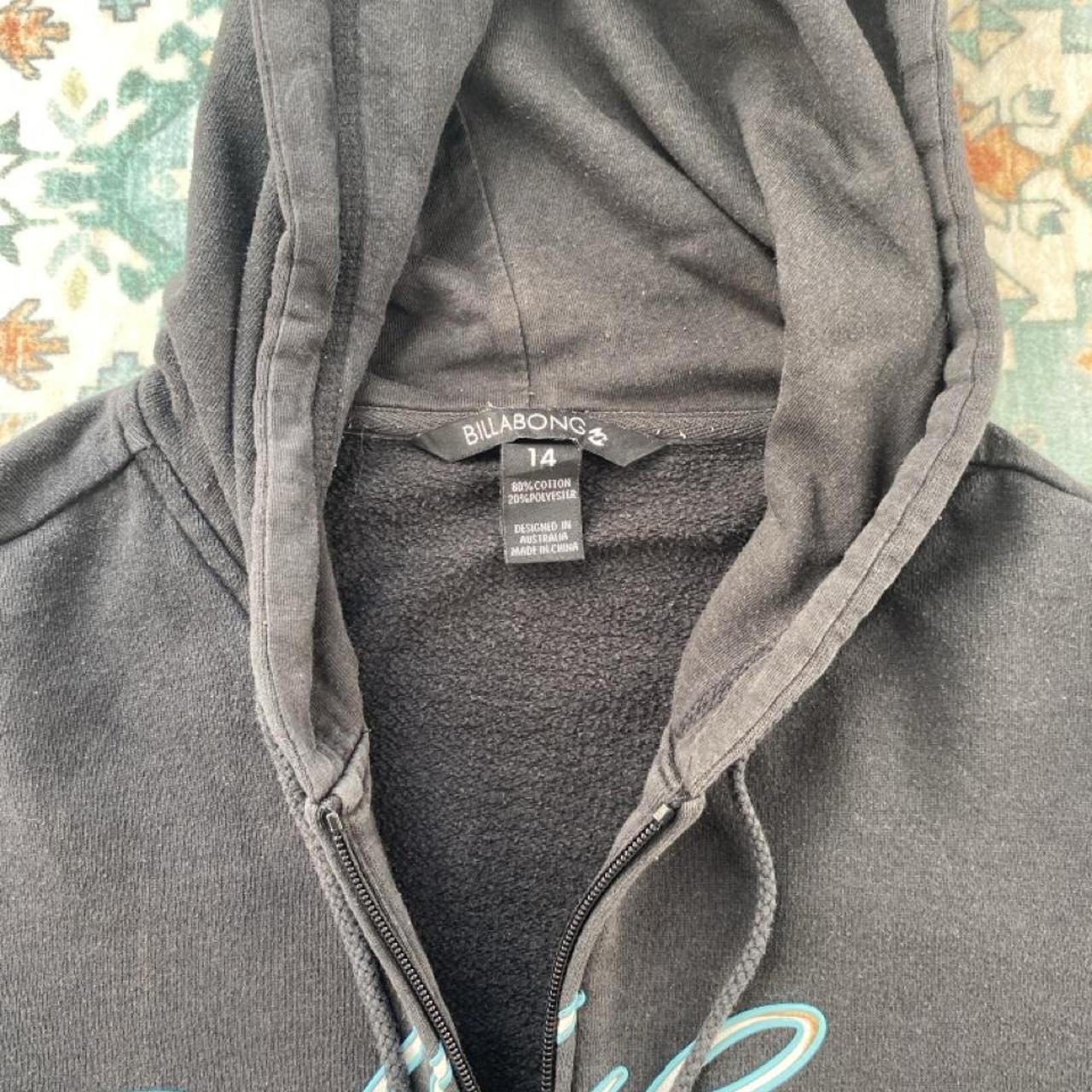 Billabong black oversized full zip hoodie with logo detail and soft material.