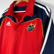 Adidas men's polo shirt in green with embroidered logo and classic collar.