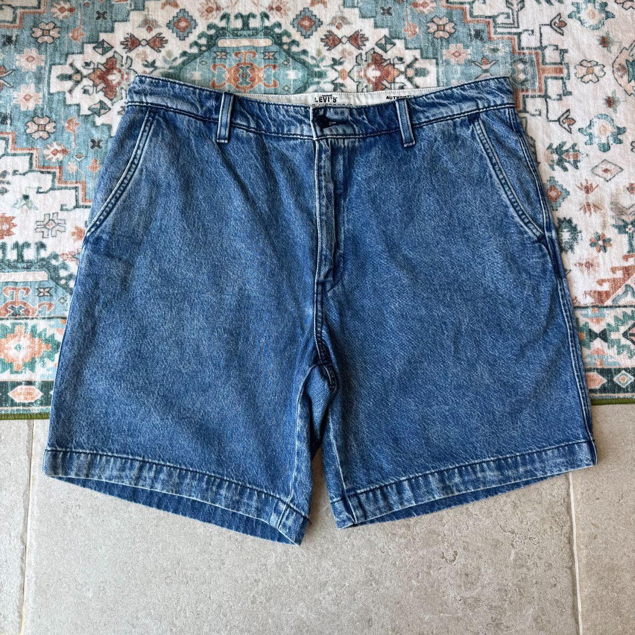 Levi's relaxed chino denim shorts in blue, featuring classic logo patch and clean design.
