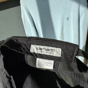 Carhartt WIP corduroy hat with embroidered logo and slight visor damage.
