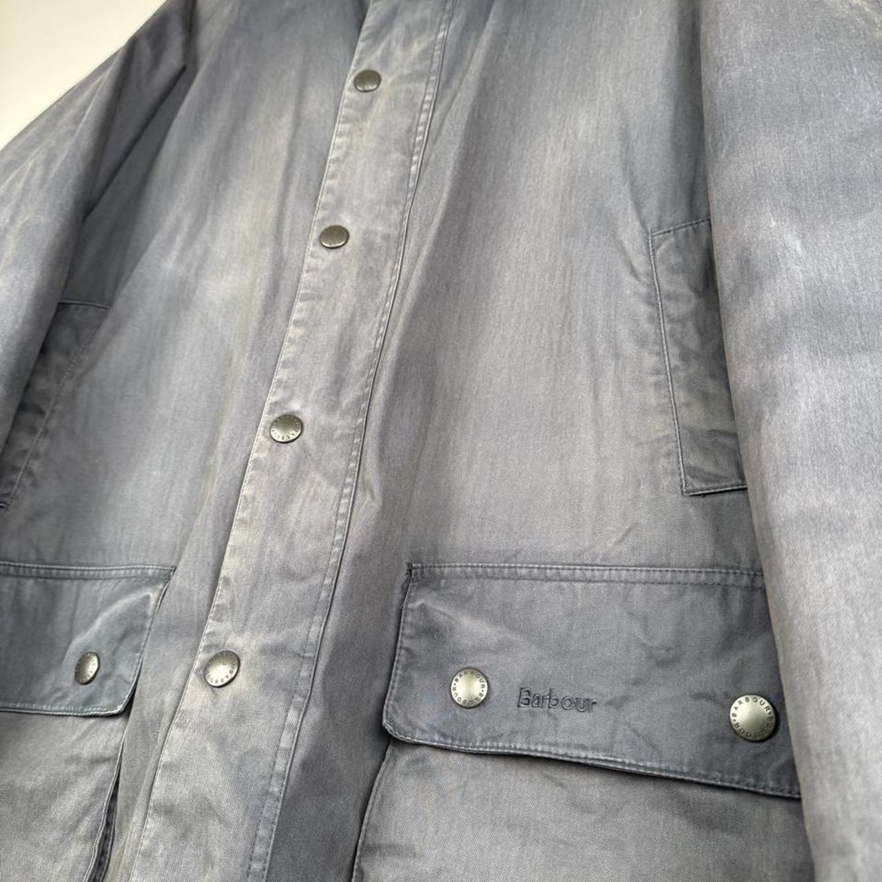 Barbour heavyweight field jacket green, classic tartan lining, durable cotton material.
