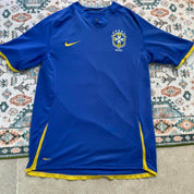 Nike blue Brazil away jersey with logo and classic design details.