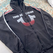 True Religion black and white full zip hoodie with logo and contrast stitching.