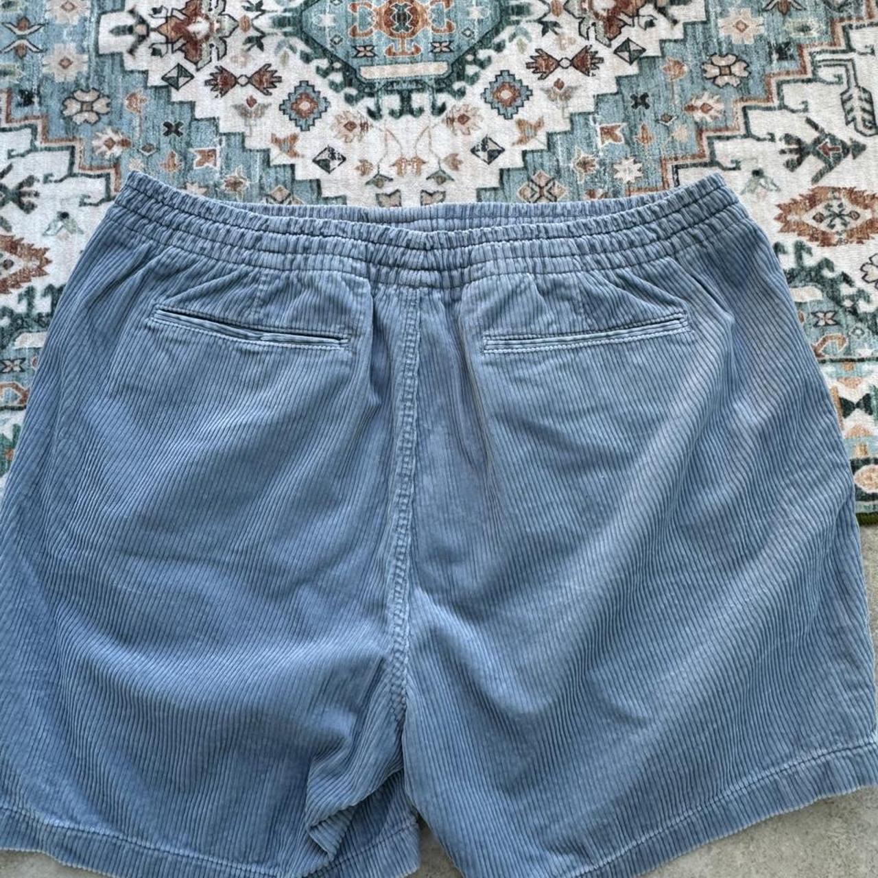 Polo Ralph Lauren baby blue corduroy shorts with logo patch and classic cut.