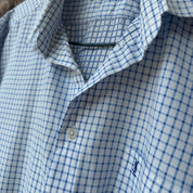 Yves Saint Laurent short sleeve button down shirt blue embroidered YSL logo.