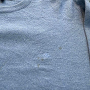Burberry light blue knitted jumper featuring iconic check pattern and soft merino wool.