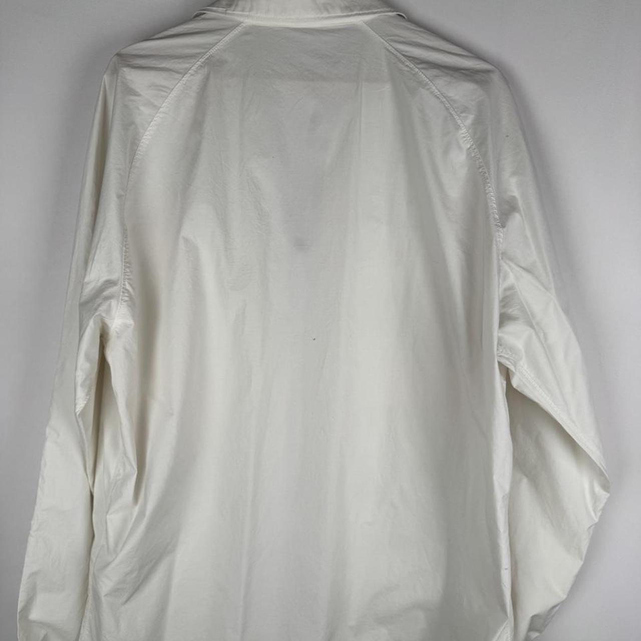 Stone Island shell jacket XL, black with logo trim and lightweight material.