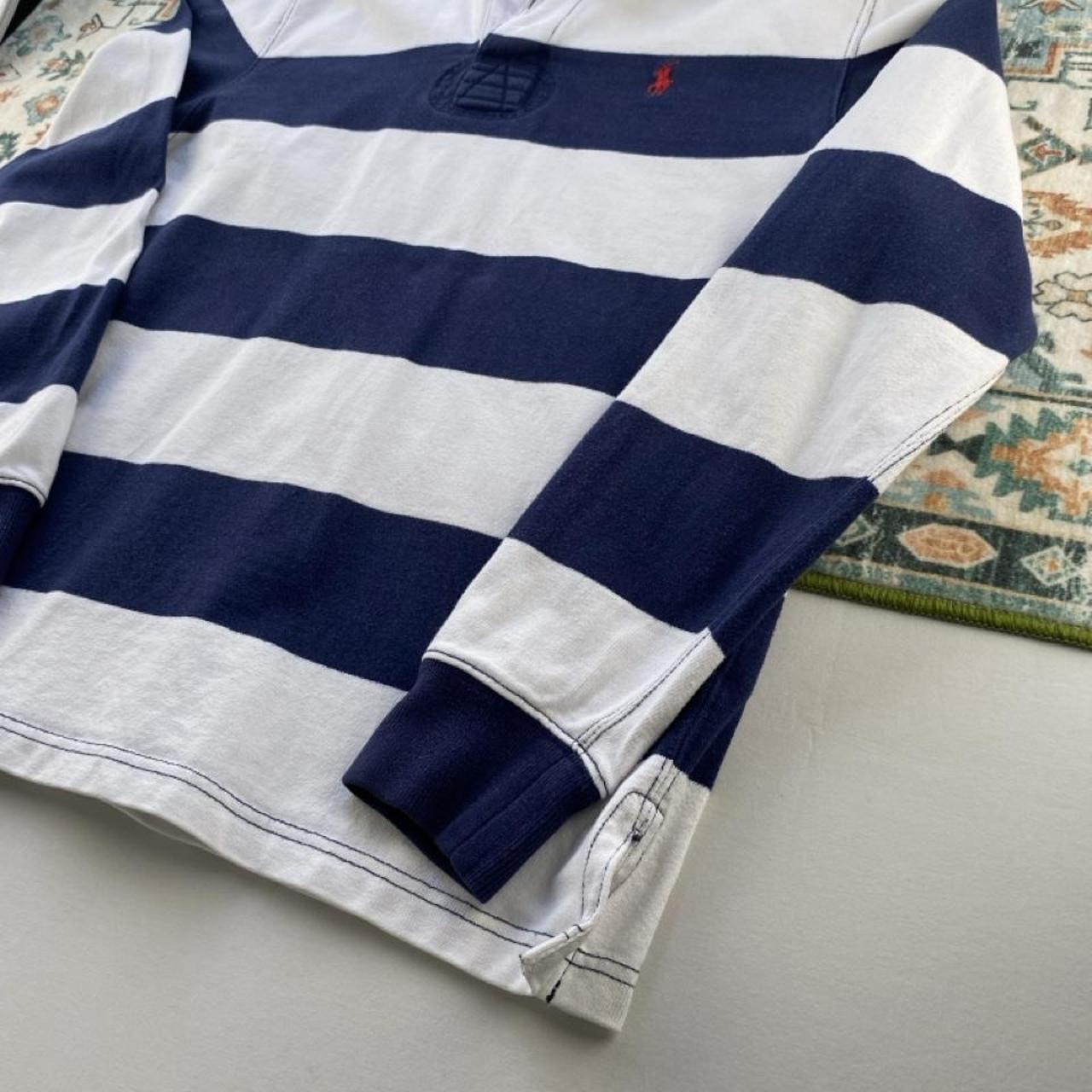 Polo Ralph Lauren navy striped rugby polo shirt with embroidered logo and thick cotton material.