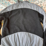 Oakley fleece jacket in cream with embroidered spellout logo and soft sherpa texture.