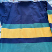 Canterbury men's long sleeve rugby polo green with Australia Wallabies logo and embroidered details.