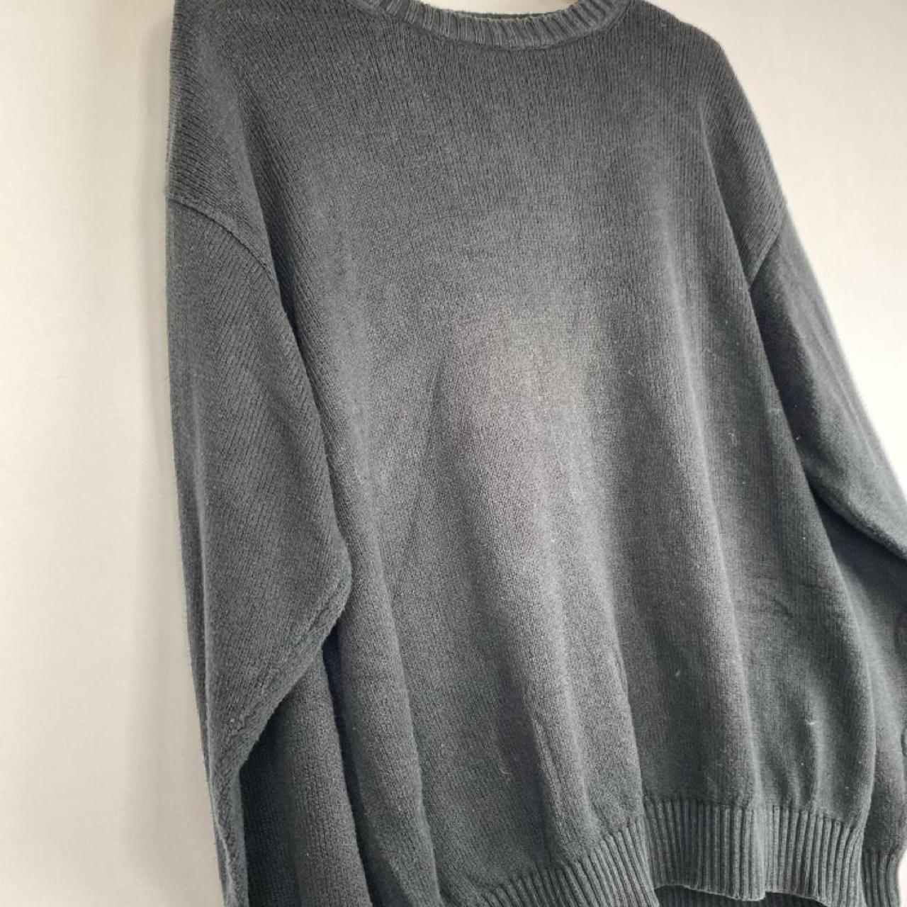 Yves Saint Laurent grey knitted jumper 1990s style with relaxed fit and ribbed texture.