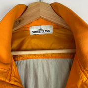 Stone Island bomber jacket in green with logo patch and micro ripstop material.