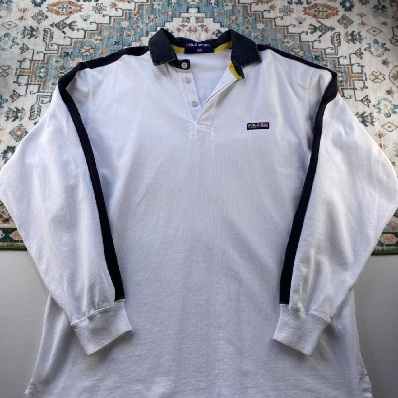 Polo Ralph Lauren white rugby polo shirt with embroidered logo and classic fit.