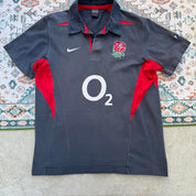 Nike England rugby polo shirt red with embroidered logo and classic collar.