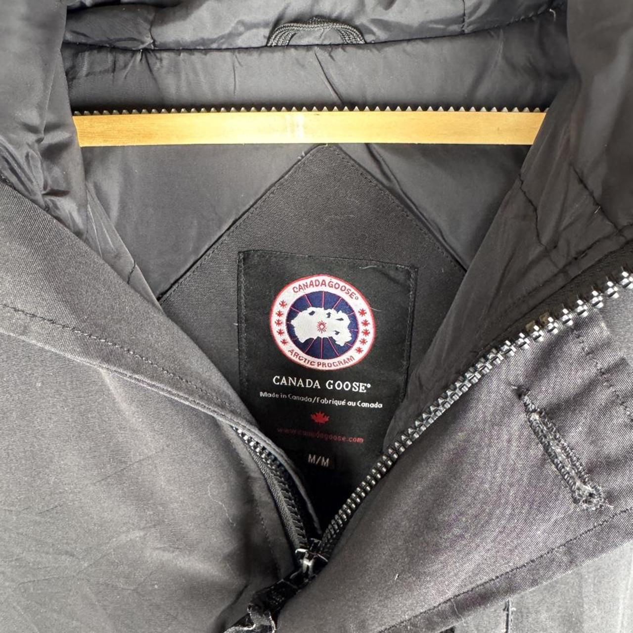 Canada Goose black parka jacket, missing fur trim, regular fit, size medium.