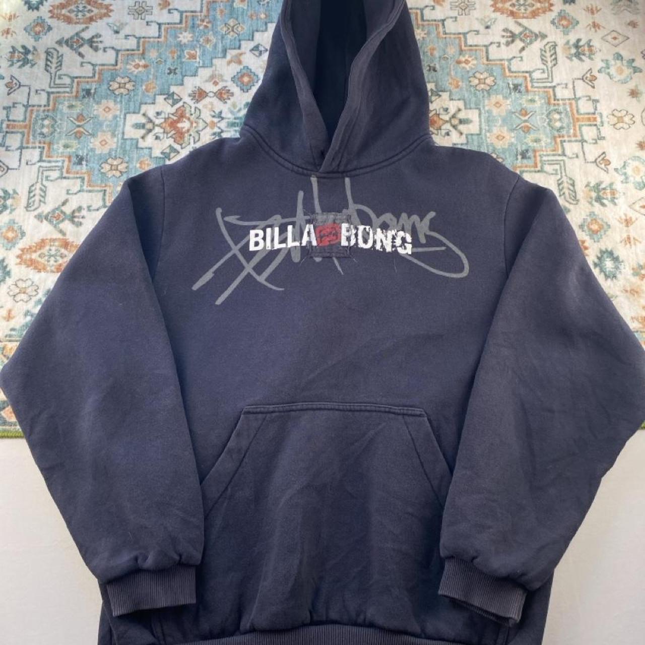 Billabong navy oversized hoodie with logo detail and soft material.