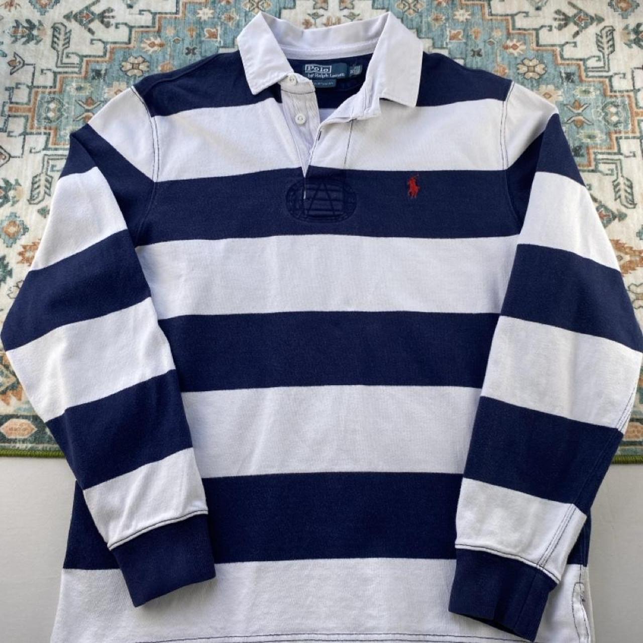 Polo Ralph Lauren navy striped rugby polo shirt with embroidered logo and thick cotton material.