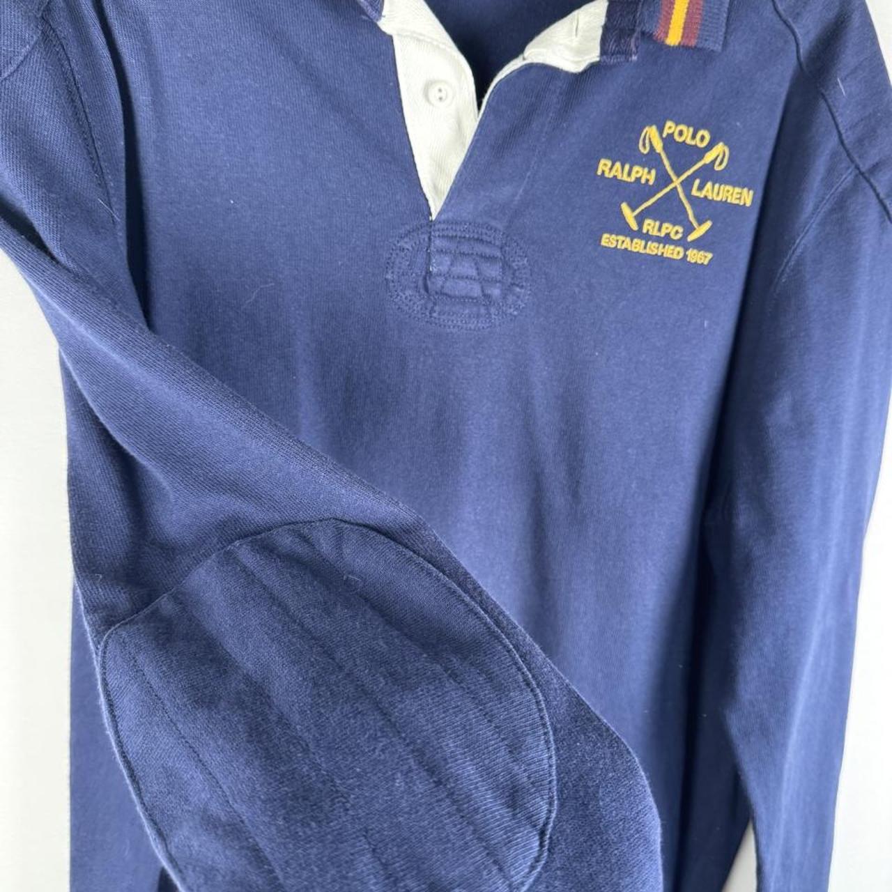 Polo Ralph Lauren men's rugby polo navy blue with embroidered logo and knitted collar.