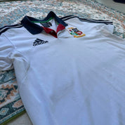 Adidas men's polo shirt red with British and Irish Lions logo and embroidered details.