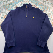 Polo Ralph Lauren navy jumper with embroidered pony logo and quarter zip detail.
