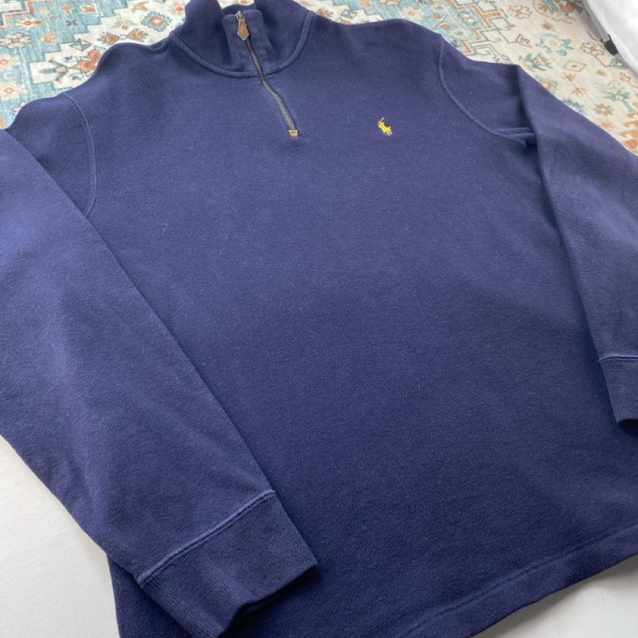 Polo Ralph Lauren navy jumper with embroidered pony logo and quarter zip detail.