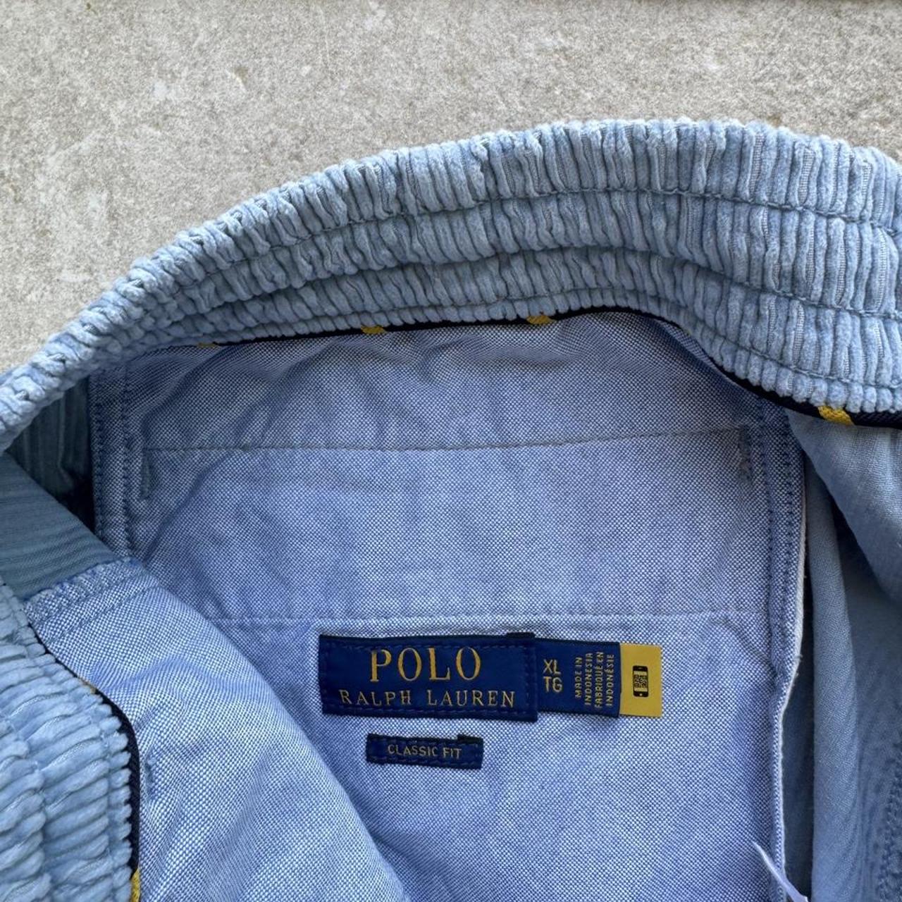 Polo Ralph Lauren baby blue corduroy shorts with logo patch and classic cut.