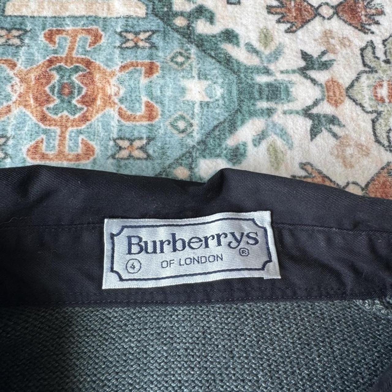Burberry striped jumper small with embroidered logo and sun fading on shoulder.