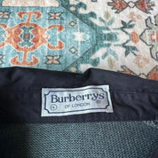 Burberry striped jumper small with embroidered logo and sun fading on shoulder.