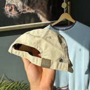 O'Neill cream hat with embroidered logo and vintage design details.