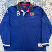 Hackett cream rugby polo with embroidered spellout logo and thick cotton material.